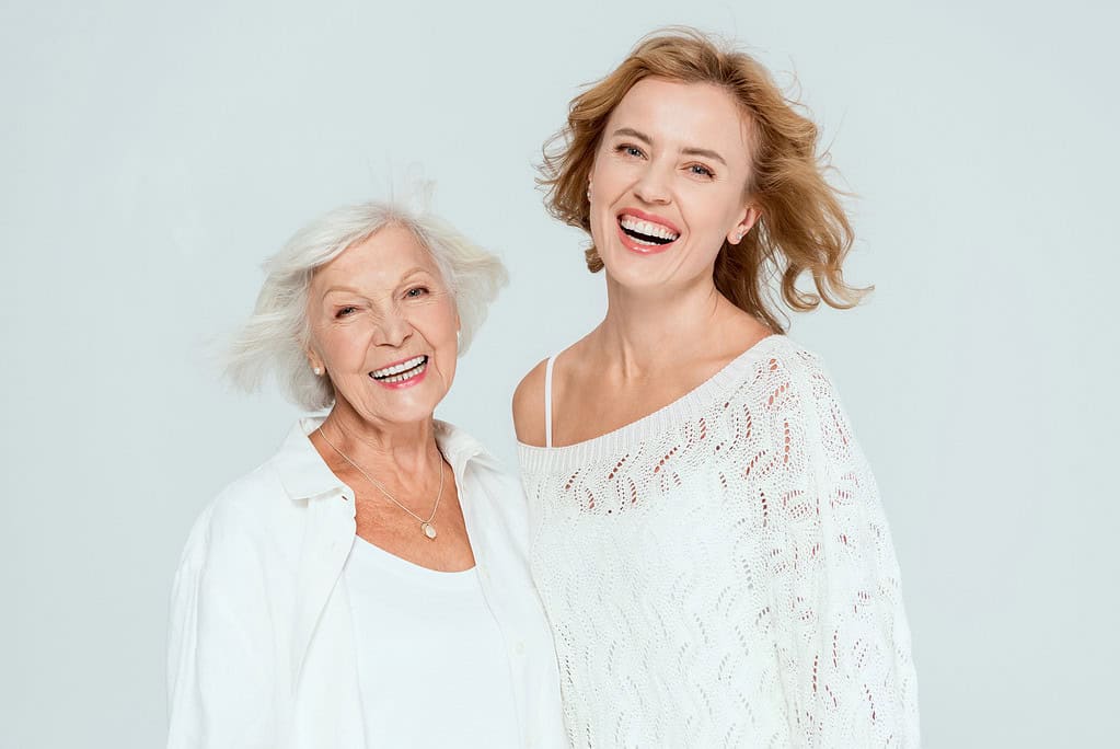 Donne sorridenti grazie a Ghiatto Clinica Dentale